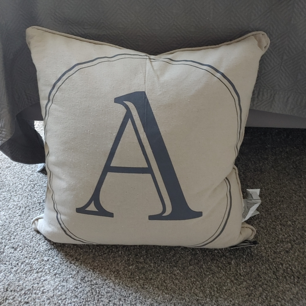 Monogram throw pillow